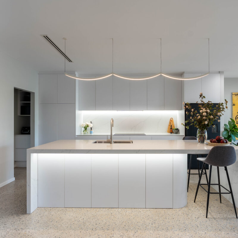 Kitchen. Classic White. Farquhar Alpine white with Zenith like Marbella benchtop and curved strip lighting and island under bench