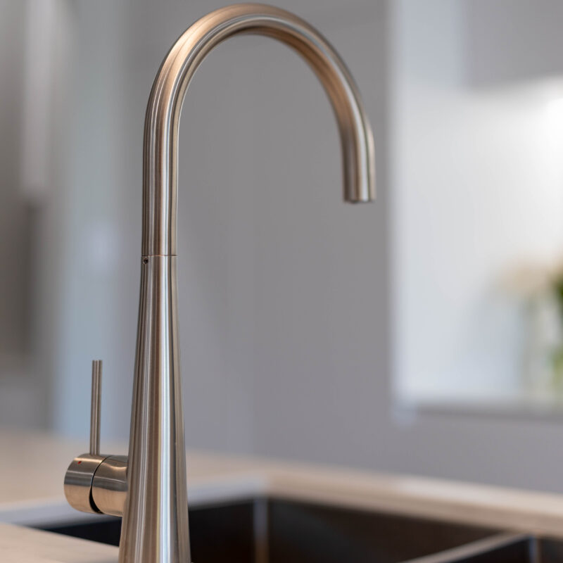 Kitchen classic white tap and sink in Oliveri silver.
