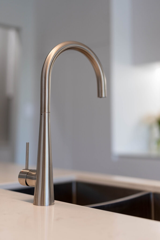Kitchen classic white tap and sink in Oliveri silver.
