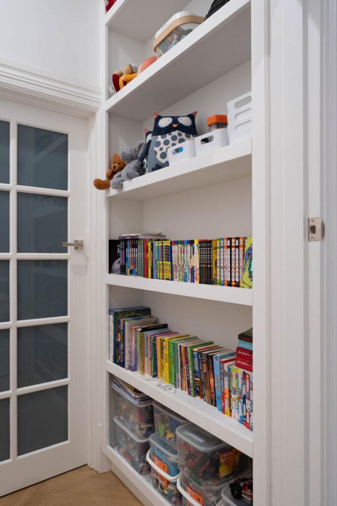 White Book shelves for storage.