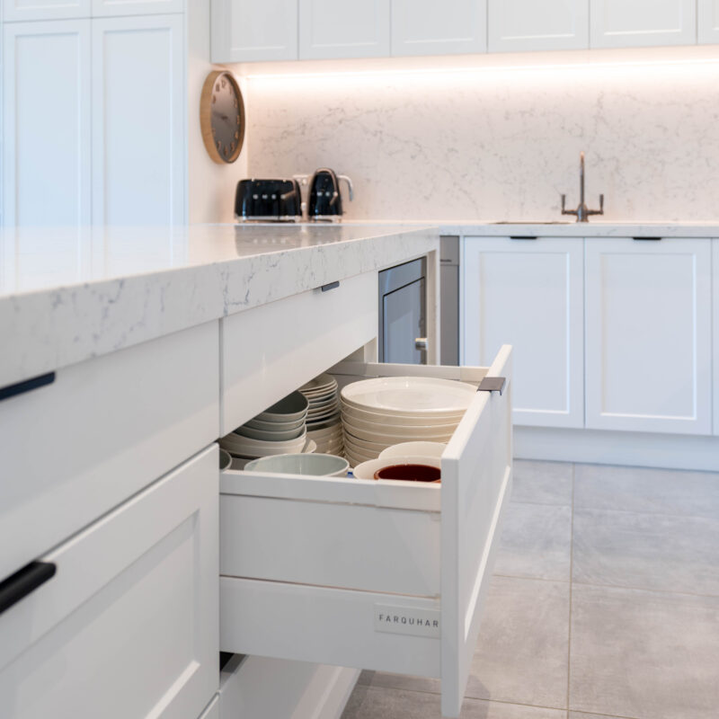 The Kitchen Island. Versatile large draws in Barossa profile cabinetry. Grey tones benchtop.
