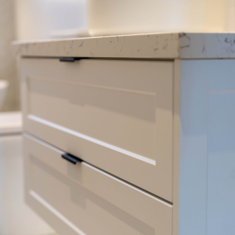 White Barossa profile cabinetry with 2 draws and round bowl.
