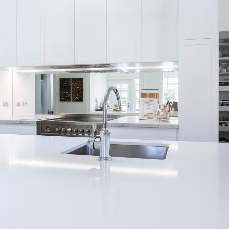 Kitchen. White and bright with walk in pantry- Barossa Profile with mirror splashback.