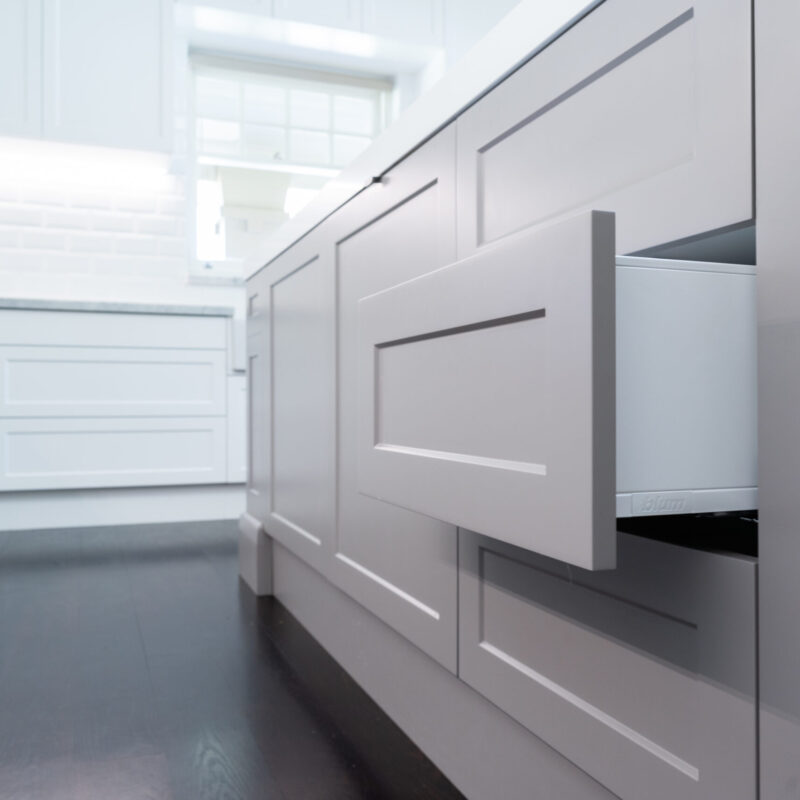 Draw units in the Island Bar space in a soft grey finish, timber floors and a white back run.