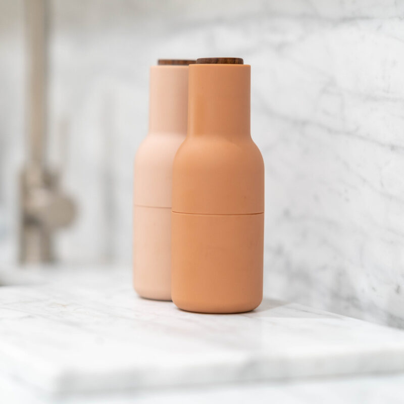 Salt and pepper on top of marble style benchtops.