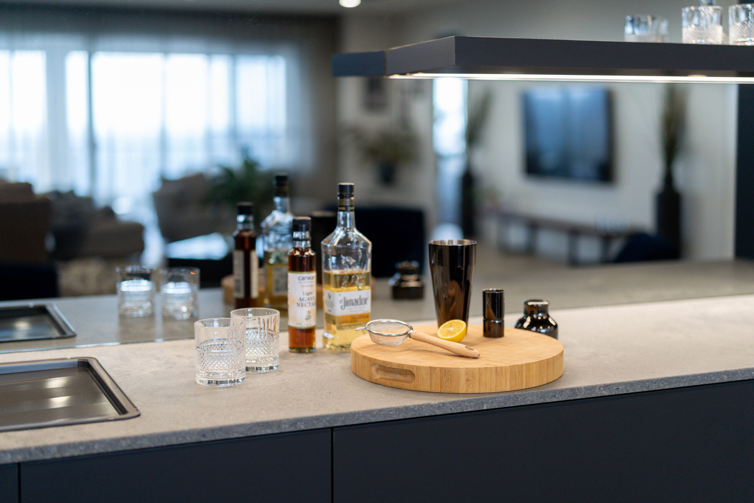 Entertainers Bar with concrete look benchtop space for preparation.