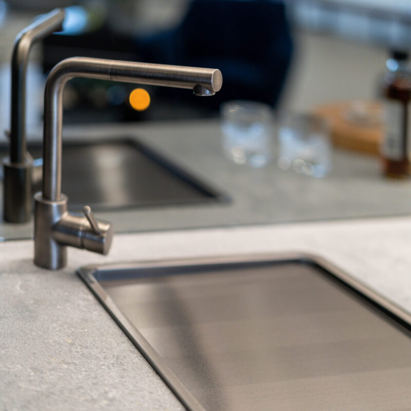 Gunmetal tap and sink space in bar.