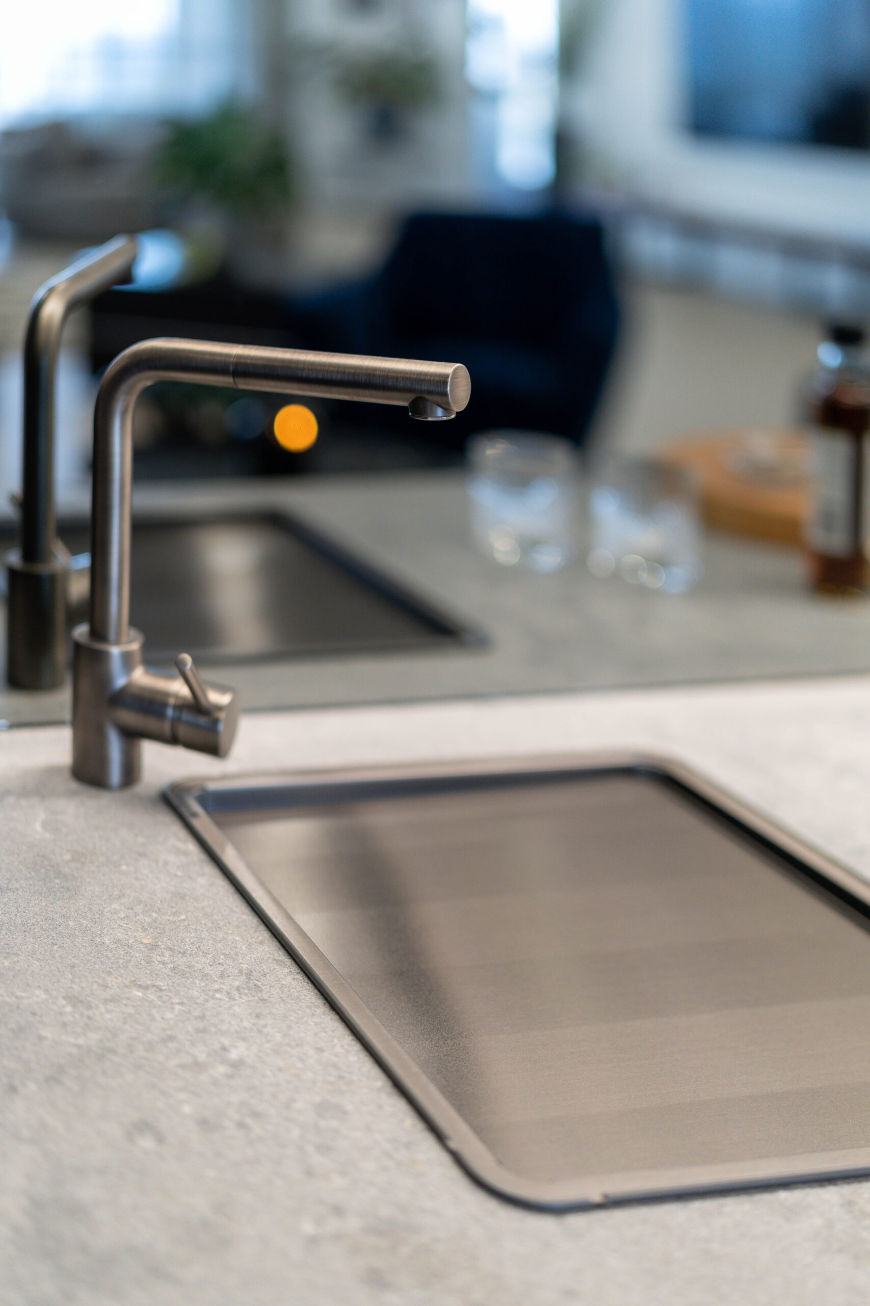 Gunmetal tap and sink space in bar.