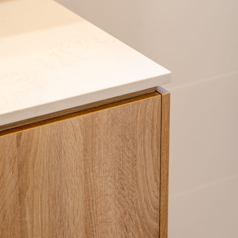 Stone top and timber cabinetry.