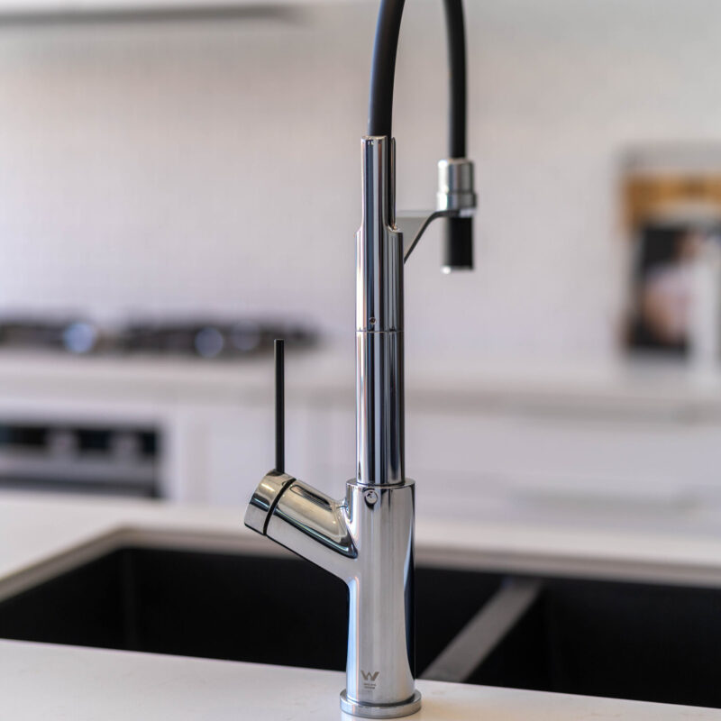 Oliveri Santorini sink and Vilo tap in black to contrast the crisp white elements.