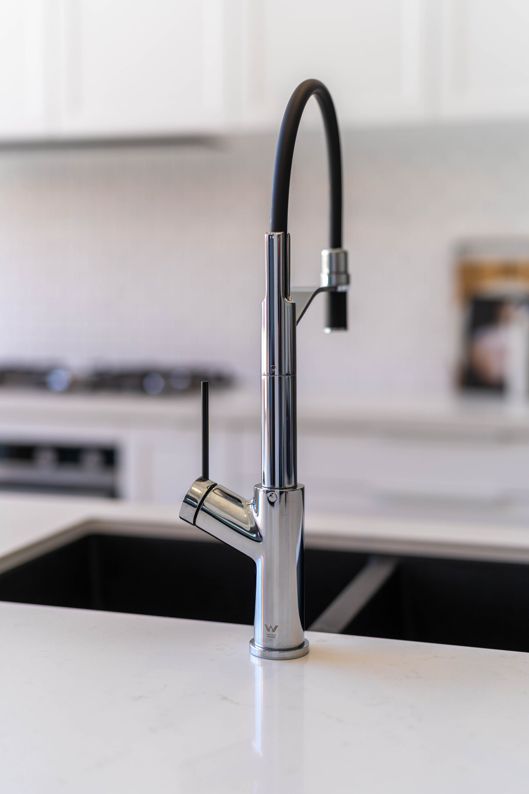 Oliveri Santorini sink and Vilo tap in black to contrast the crisp white elements.